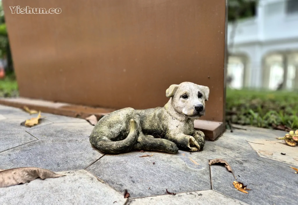 Figurine of a cute house dog or puppy in this case