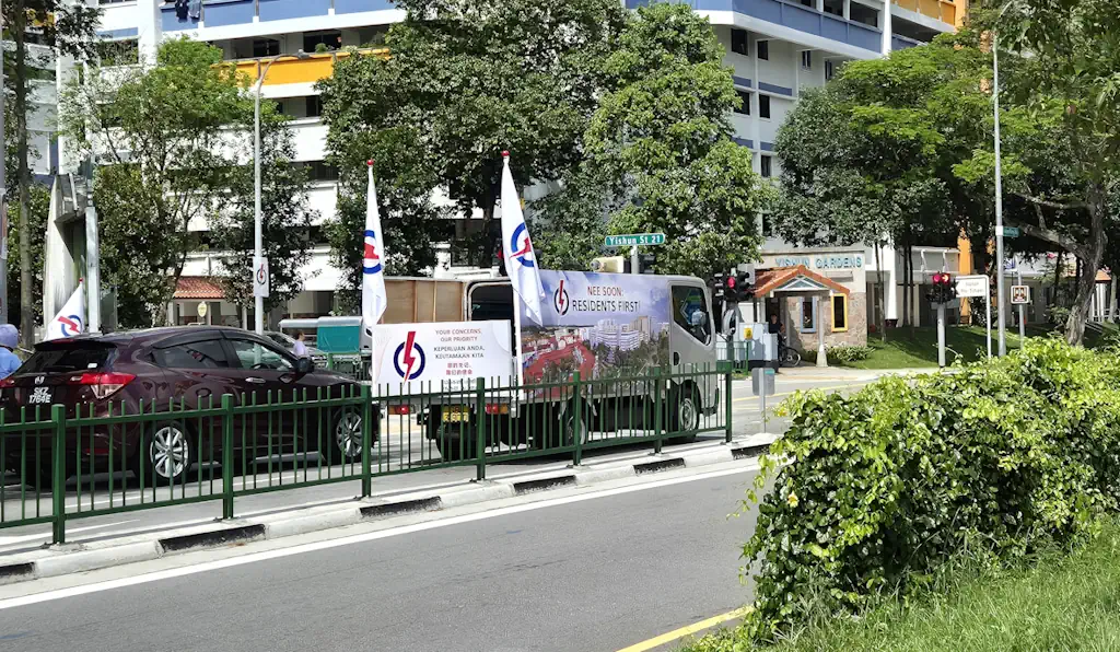 A perambulating truck broadcasting election messages from the PAP team