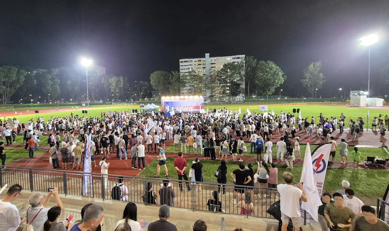 View of the rally stage and crowd from the stadium grandstand